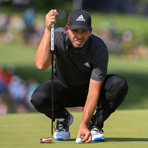 Sergio Garcia lines up a putt on the ninth green d