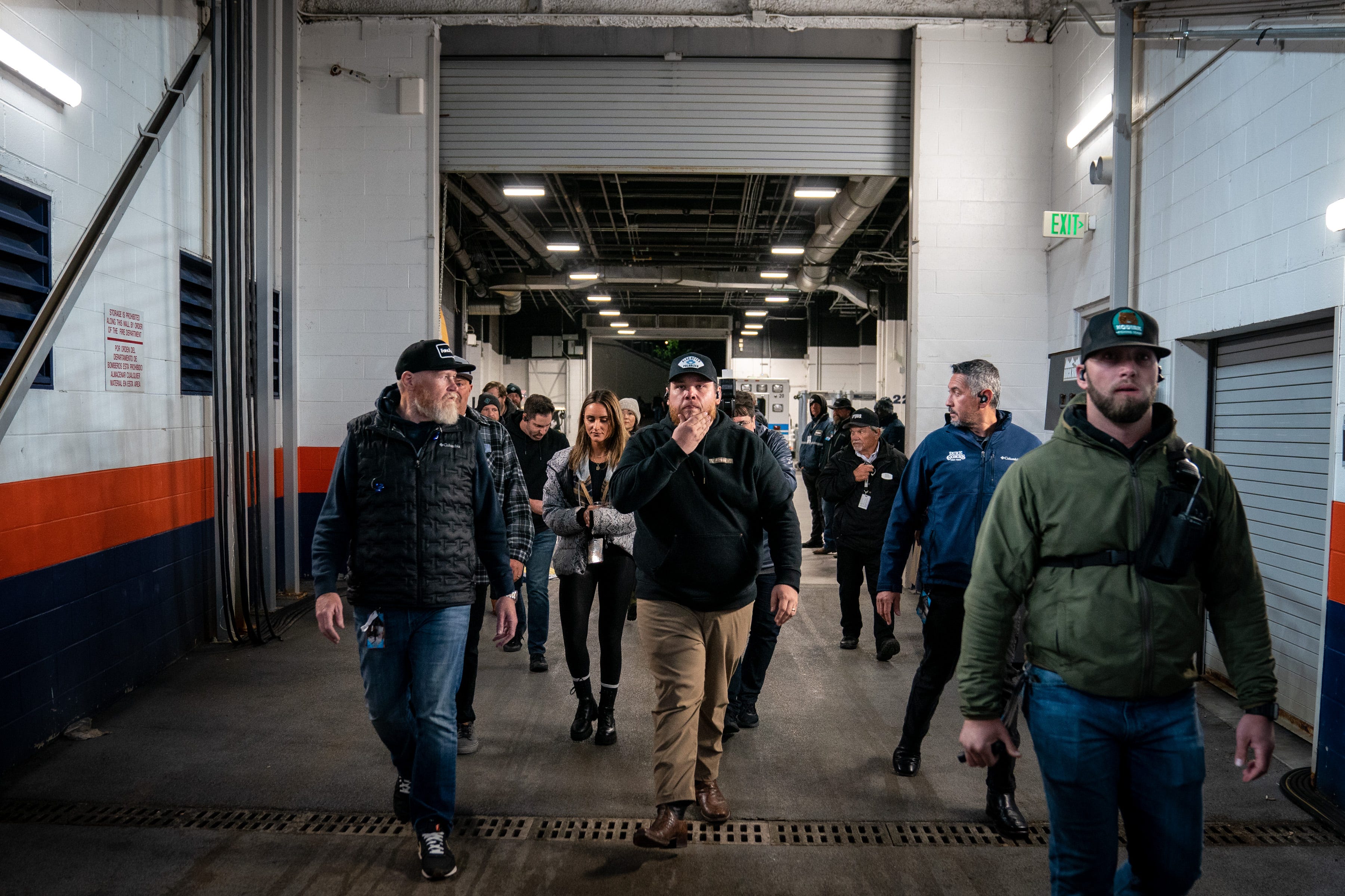 Luke Combs heads to the stage before performing at Empower Field at Mile High in Denver, Colo., Saturday, May 21, 2022. The show kicked off Combs’ first-ever headlining stadium tour.