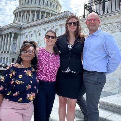 Whitney Austin, second from right, with her husban