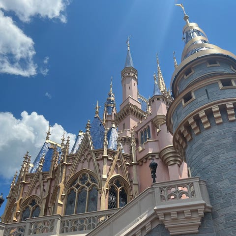 Cinderella Castle is seen up close from Fantasylan