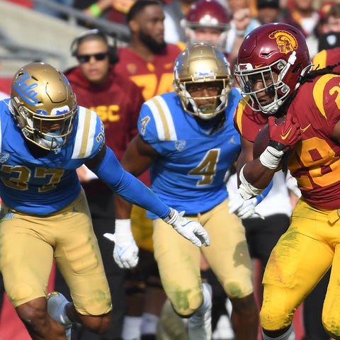 USC running back Keaontay Ingram runs past UCLA Br