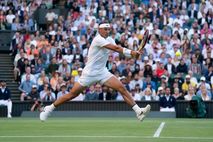 Rafael Nadal returns a shot during his match against Botic Van De Zandschulp on July 4, 2022 at the All England Lawn Tennis and Croquet Club in London, England.