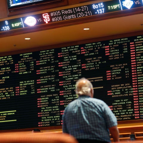 Betting odds are displayed on a board in the sport