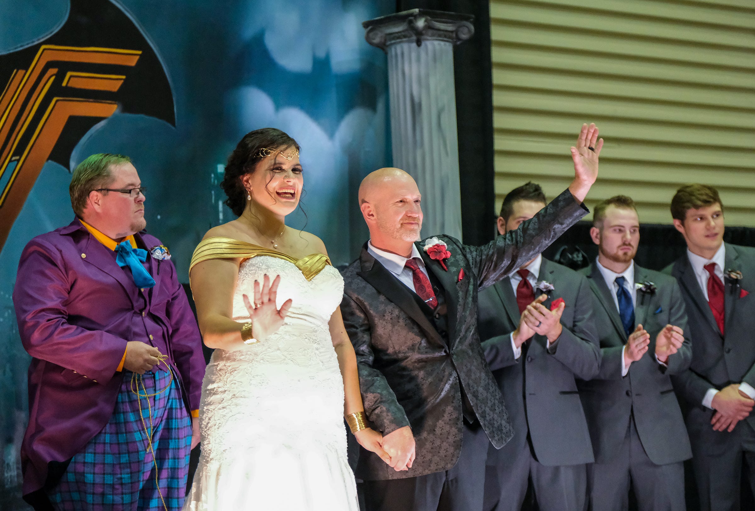 Lansing Batman and Wonder Woman wedding behind the Wonderbat marriage,