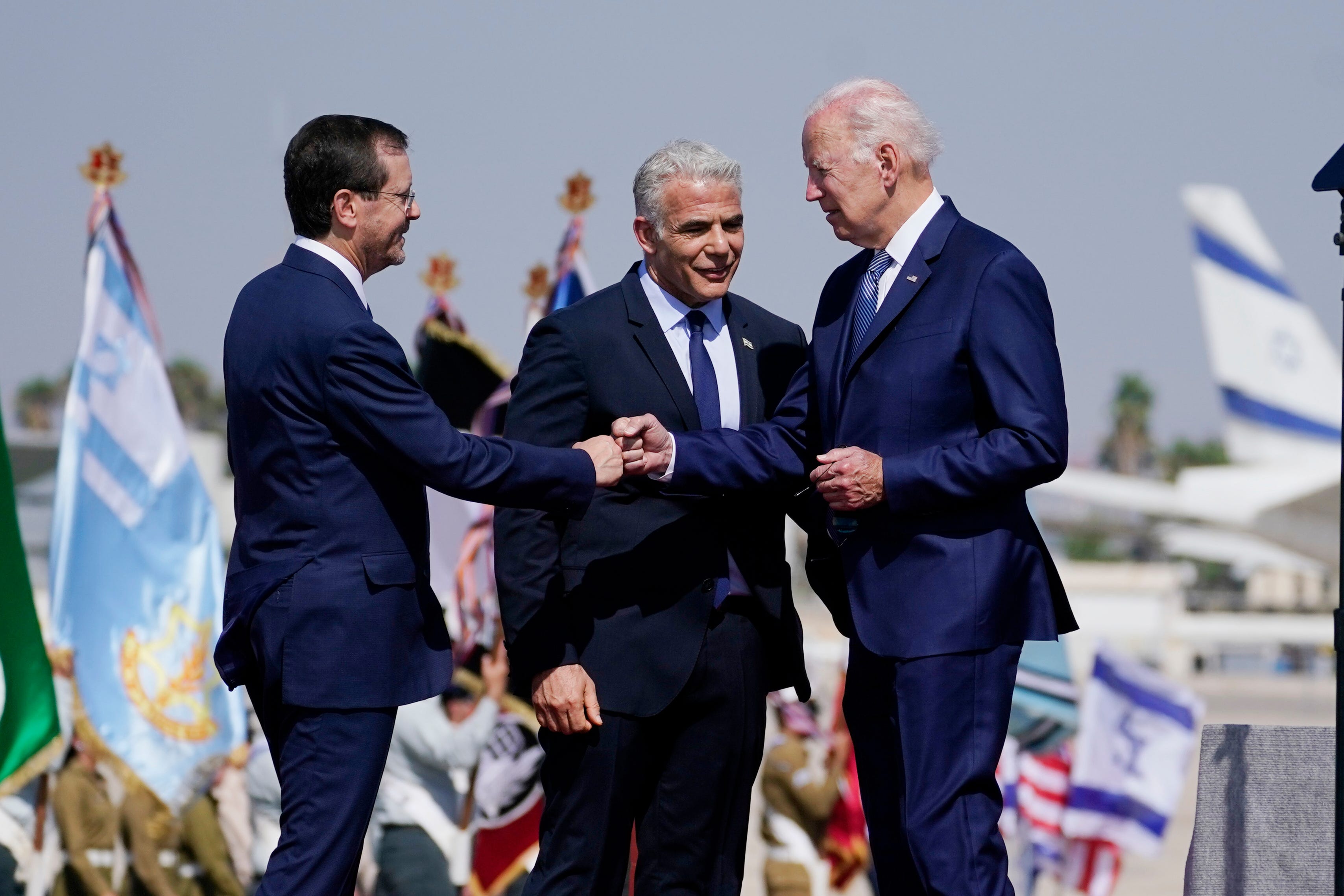 Biden's COVID Measures In Israel, Saudi Arabia May Mean Few Handshakes