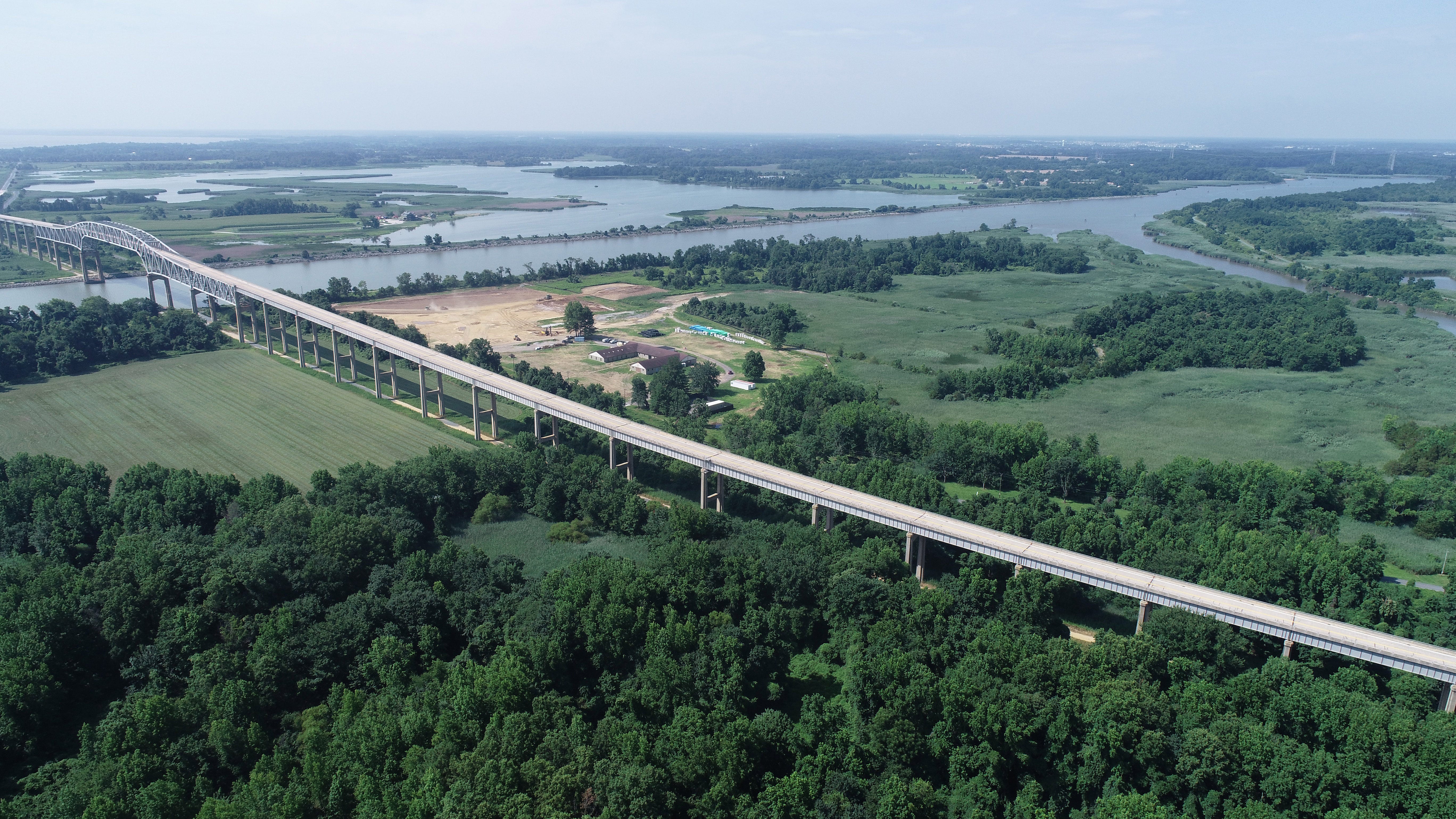 An aerial view of the Grassdale area (right) near the Reedy Point Bridge in Delaware City.  The land was sold by the Fort DuPont Redevelopment and Preservation Corporation to the Blue Water Development for an RV park and campground.