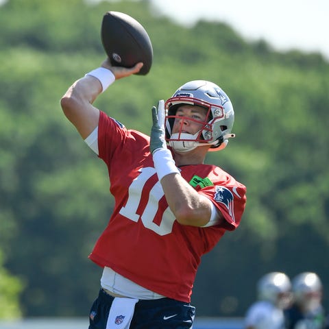 New England Patriots quarterback Mac Jones throws 