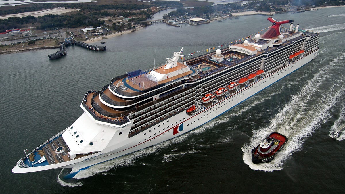 FILE - MARCH 21, 2016: According to reports, Carnival Corporation has gained approval to operate cruise ships between Miami, Florida and Havana, Cuba. The approval marks the first time a cruise line has been allowed to operate between the U.S. and Cuba in over 50 years. JACKSONVILLE, FL - FEBRUARY 23:  The 2,124-passenger Carnival Miracle sails up the St. John's River after a trans-Atlantic voyage from its Finnish shipyard February 23, 2004 in Jacksonville, Florida. The   960-foot-long liner is the first ship to sail from JaxPort for Miami-based Carnival Cruise Lines. Former U.S. Army Pfc. Jessica Lynch is to formally name the vessel in a ceremony in Jacksonville February 27.  (Photo by Andy Newman/Carnival Cruise Lines via Getty Images) ORG XMIT: 598064639 ORIG FILE ID: 3008378