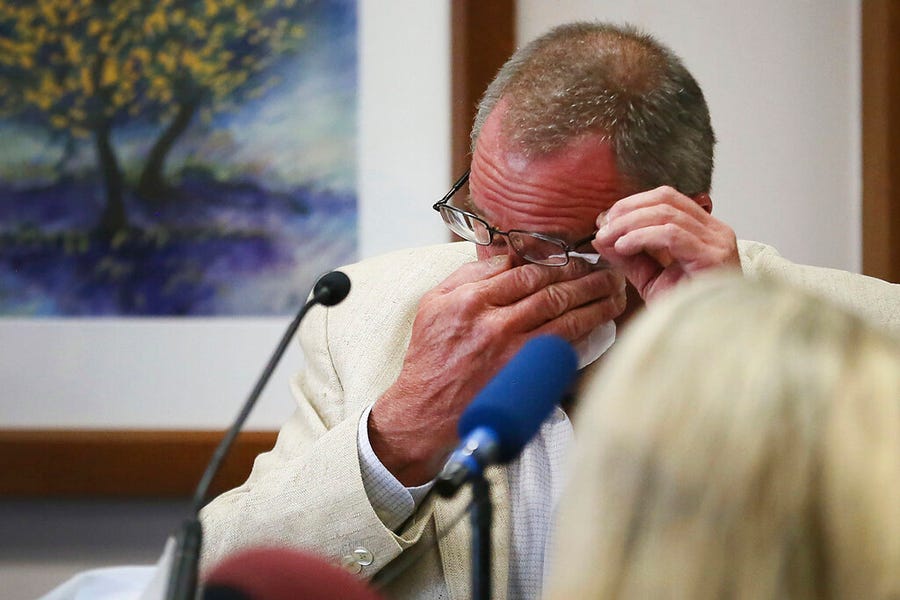 Neil Heslin, father of 6-year-old Sandy Hook shooting victim Jesse Lewis, becomes emotional during his testimony during the trial for Alex Jones, Tuesday Aug. 2, 2022, at the Travis County Courthouse in Austin.  Jones has been found to have defamed the parents of a Sandy Hook student for calling the attack a hoax.