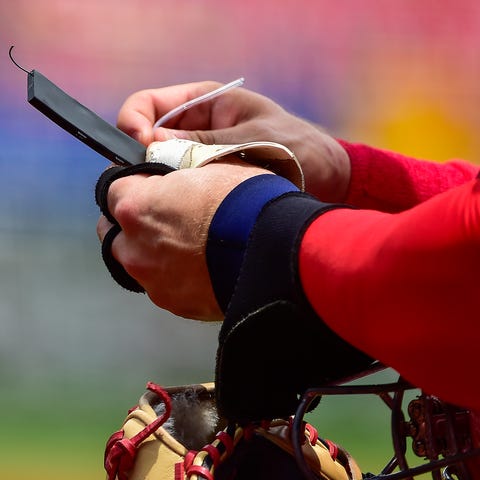 Cardinals catcher Andrew Knizner with his PitchCom