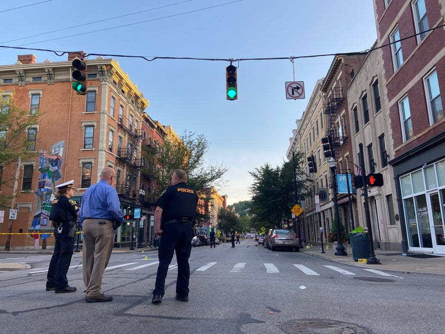 Investigators have blocked off streets in Over-the-Rhine on Sunday morning. Police say at least nine people were injured in a shooting outside Mr. Pitiful's bar at 13th and Main streets at about 1:40 a.m.