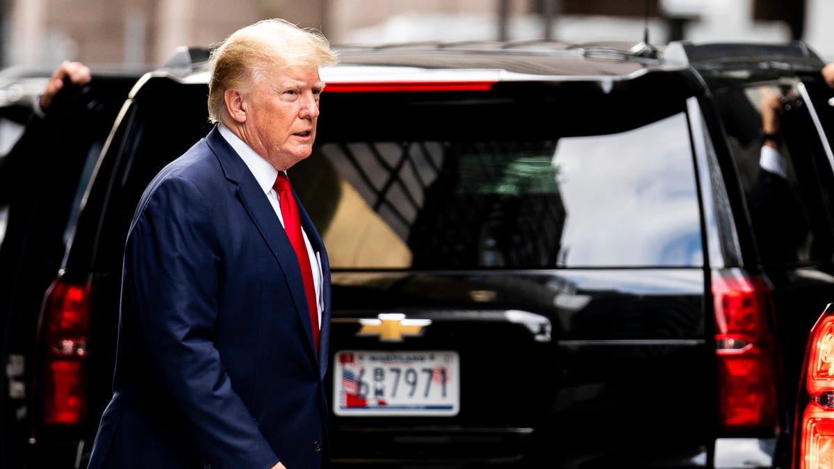 Former President Donald Trump departs Trump Tower, Wednesday, Aug. 10, 2022, in New York, on his way to the New York attorney general's office for a deposition in a civil investigation.