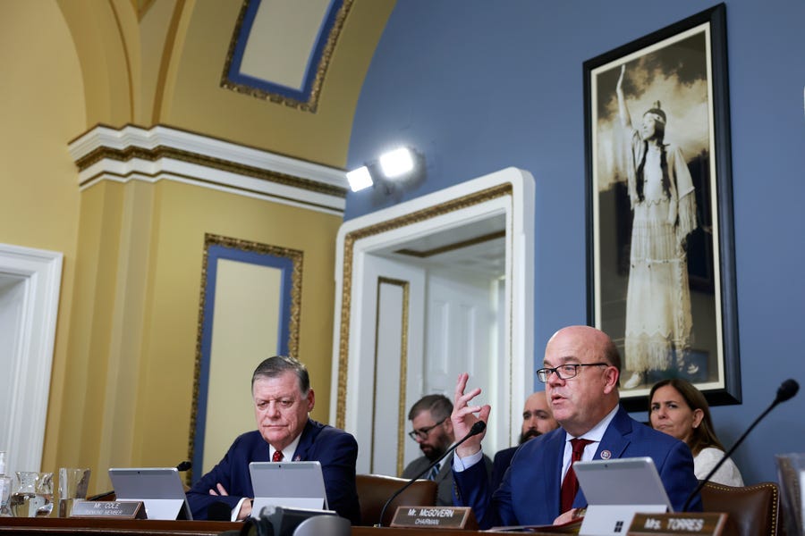 Ranking Member Tom Cole (R-OK) (L) listens as Chairman Jim McGovern (D-MA) (R) speaks at a hearing with the House Rules Committee at the U.S. Capitol Building on August 10, 2022 in Washington, DC. Members of the U.S. House of Representatives will reconvene later this week to vote on the Inflation Reduction Act.