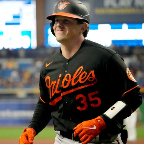 Rutschman reacts after hitting a home run at Tropi