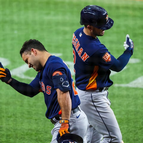 Houston's Jose Altuve and Alex Bregman celebrate a