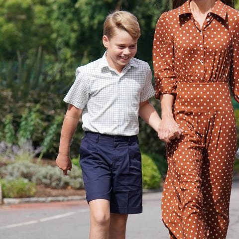 Prince George, accompanied by his mother, Duchess 