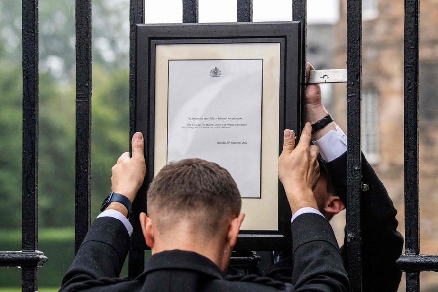 A notice is placed on the gates of the Palace of Holyroodhouse in Edinburgh, on Sept. 8, 2022 following the announcement of the death of Britain's Queen Elizabeth II.