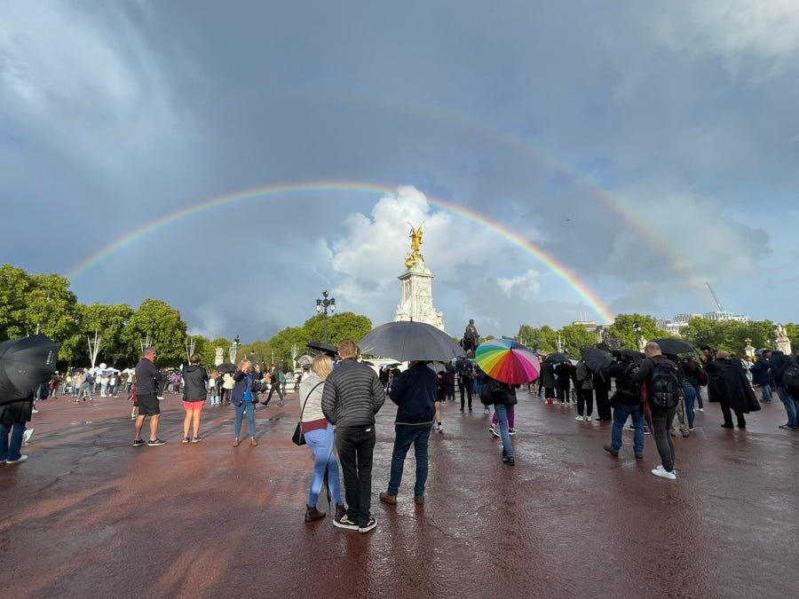 9/8/22 12:44:37 PM --- A rainbow is seen beyond the Queen Victoria Memorial, opposite Buckingham Palace, in London, Thursday, Sept. 8, 2022. People gathered around  Buckingham Palace after the the announcement of the death of Queen Elizabeth II. Britain's longest-reigning monarch, died Thursday after 70 years on the throne. Photo by Immy Share, Newsquest