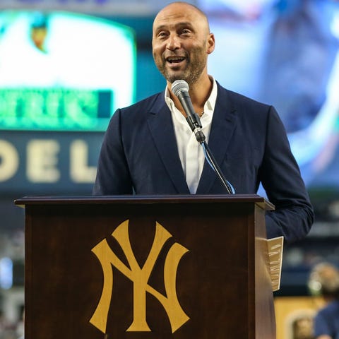 Derek Jeter speaks during a ceremony before the Ya