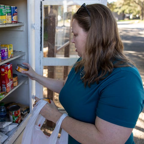 Jennifer King, a "couponer" and budget shopper, st