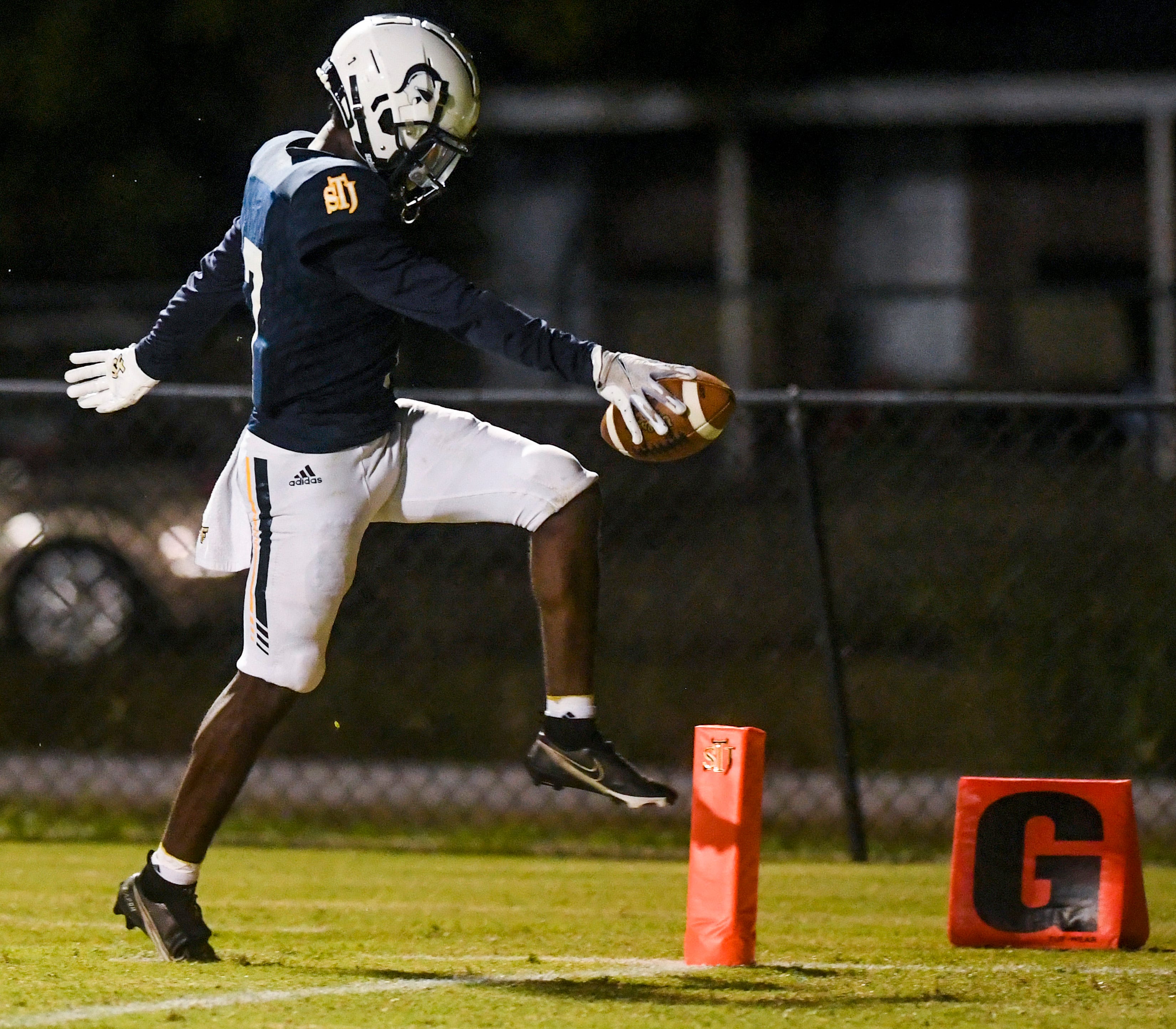 St. James football's Cosner Harrison puts team success over milestones