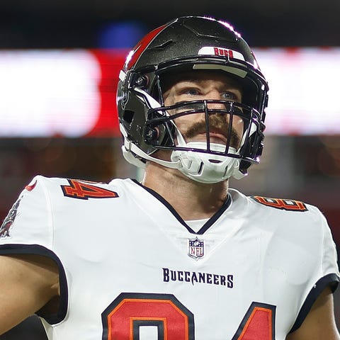 Cameron Brate looks on prior to the game against t