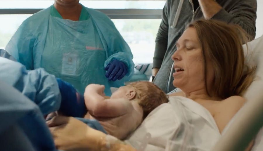 In this image taken from a campaign video posted by Katie Darling, Darling holds her newborn son moments after giving birth. Darling said she was seven months pregnant when she decided to join Louisiana's U.S. House race in reaction to the U.S. Supreme Court ruling in June 2022 that ended constitutional protections for abortion.