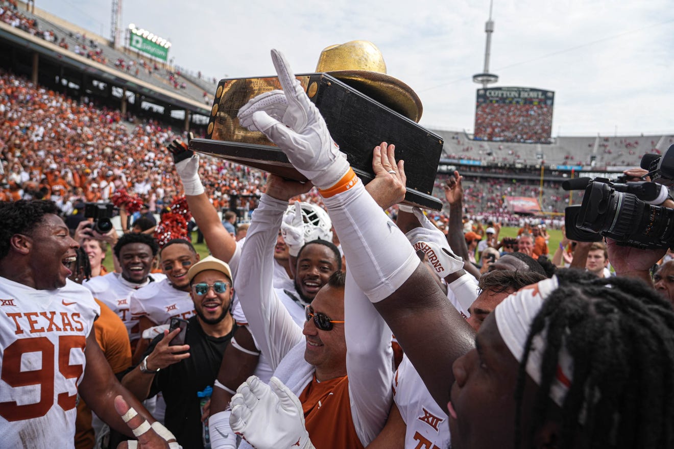 Texas fans celebrate Longhorns' win over Oklahoma at Cotton Bowl