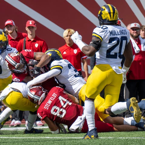 Indiana running back Josh Henderson (26) is tackle