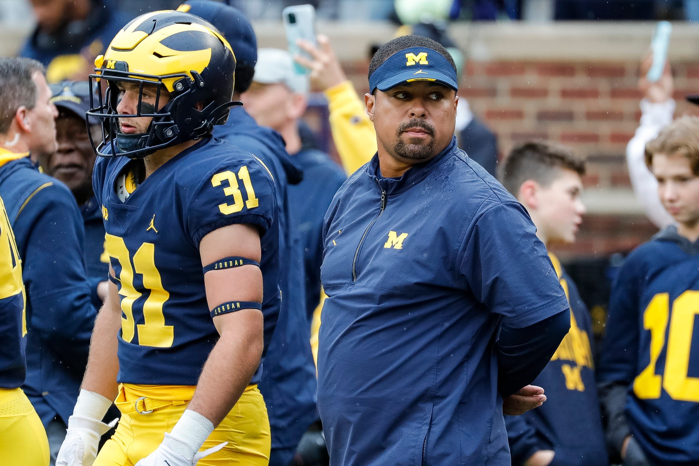 Mike Hart, Michigan coach, carted off field after collapse at Indiana