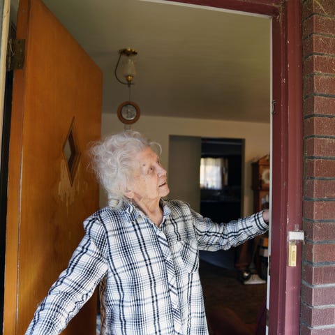 Antoinette "Toni" Stark, 99, points out an exterio