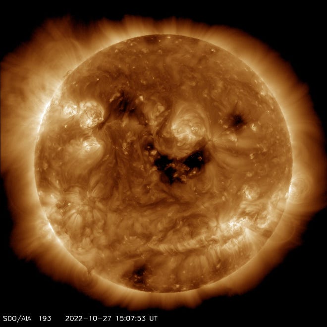 Smiling Sun Nasas Satellite Captures Photo Of Happy Looking Sun