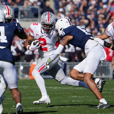 Ohio State wide receiver Emeka Egbuka (2) tries to