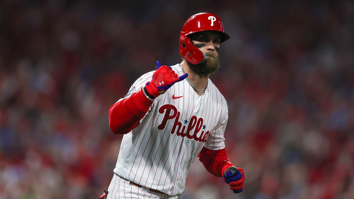 Phillies designated hitter Bryce Harper hits a two run home run against the Astros in the first inning.