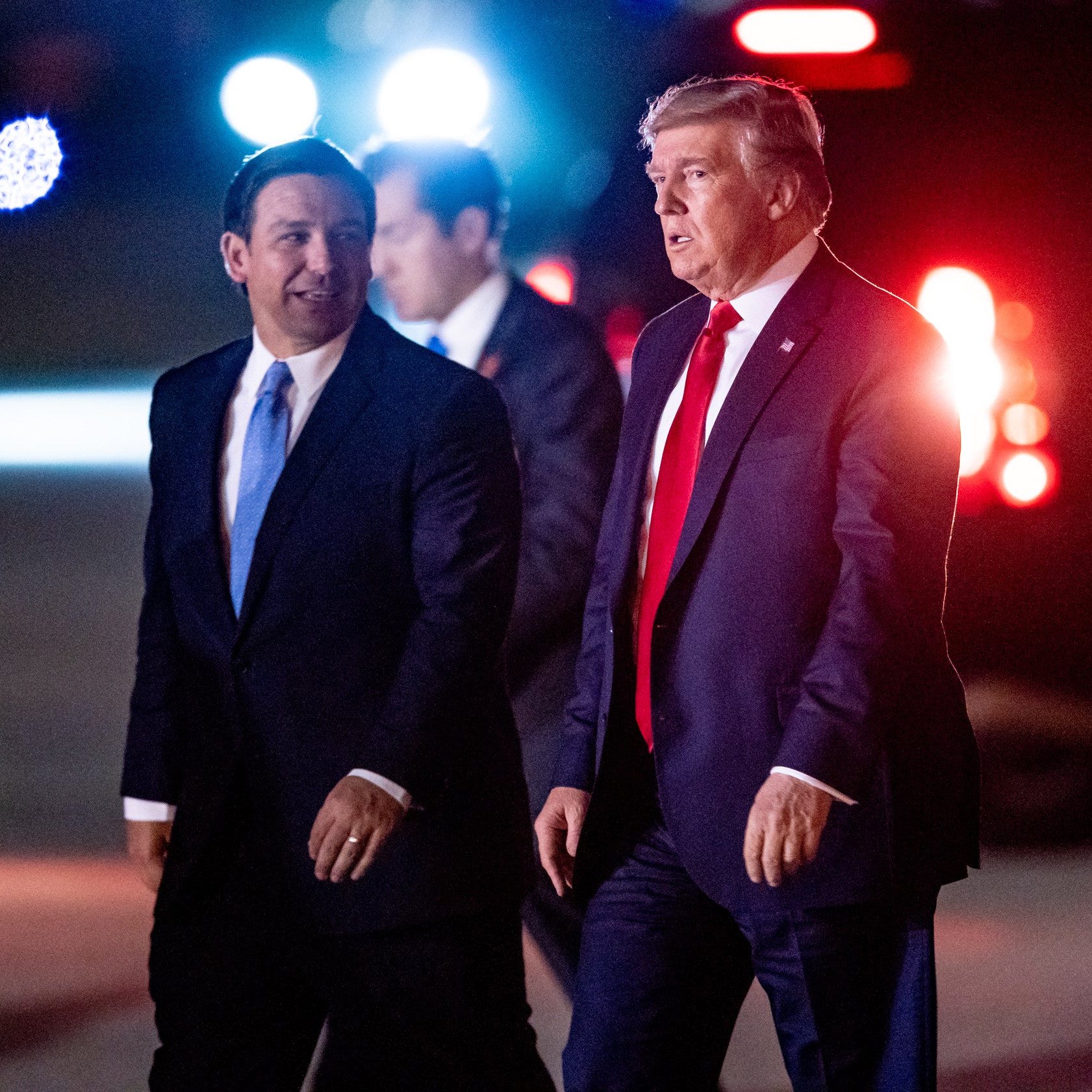 President Donald Trump arrives on Air Force One greeted by Governor Ron DeSantis at Palm Beach International Airport in West Palm Beach, Florida on Tuesday November 26, 2019.