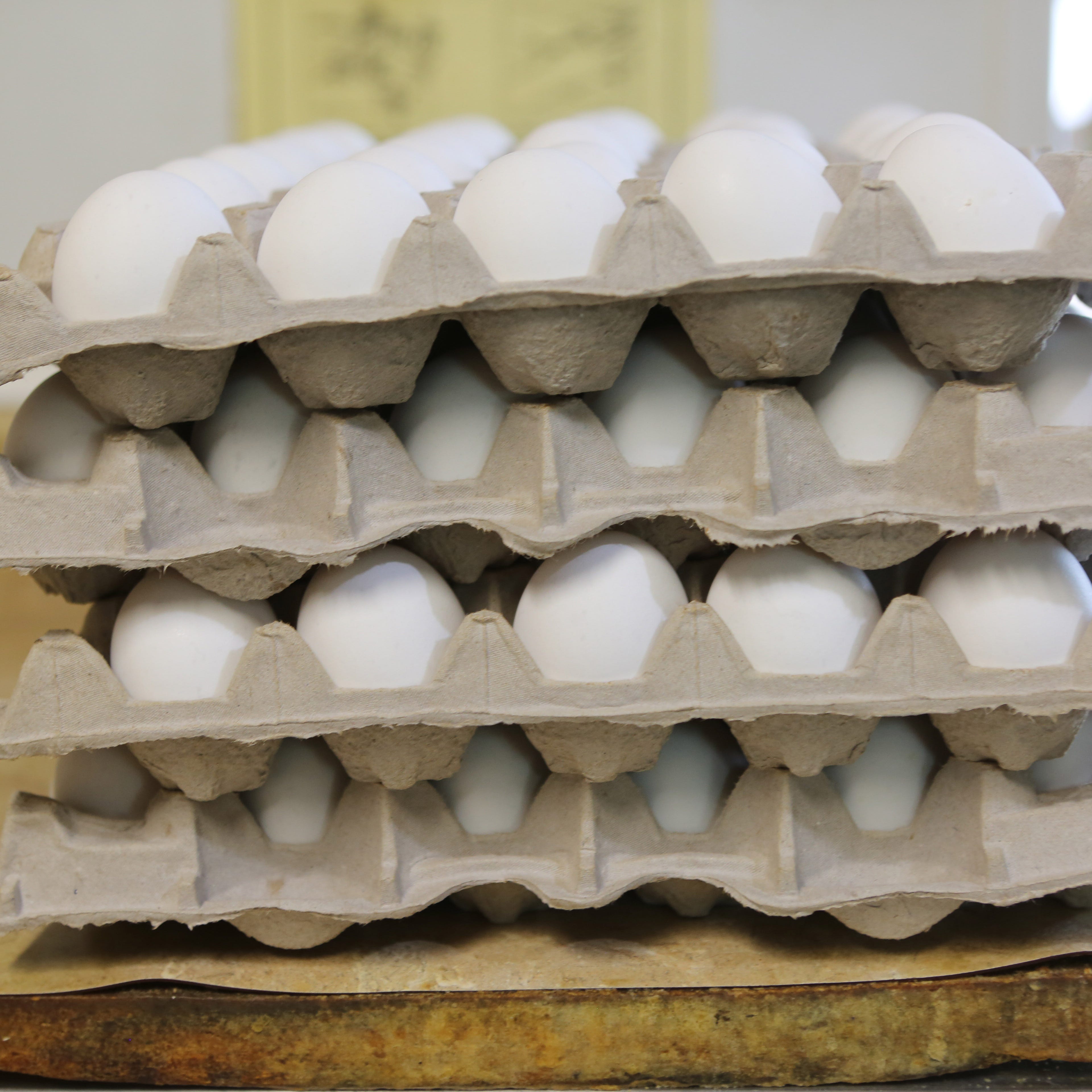 A stack of over a hundred eggs await the stove at Helen's Sausage House.  The famous Delaware eatery serves over 300 eggs on a normal weekday.