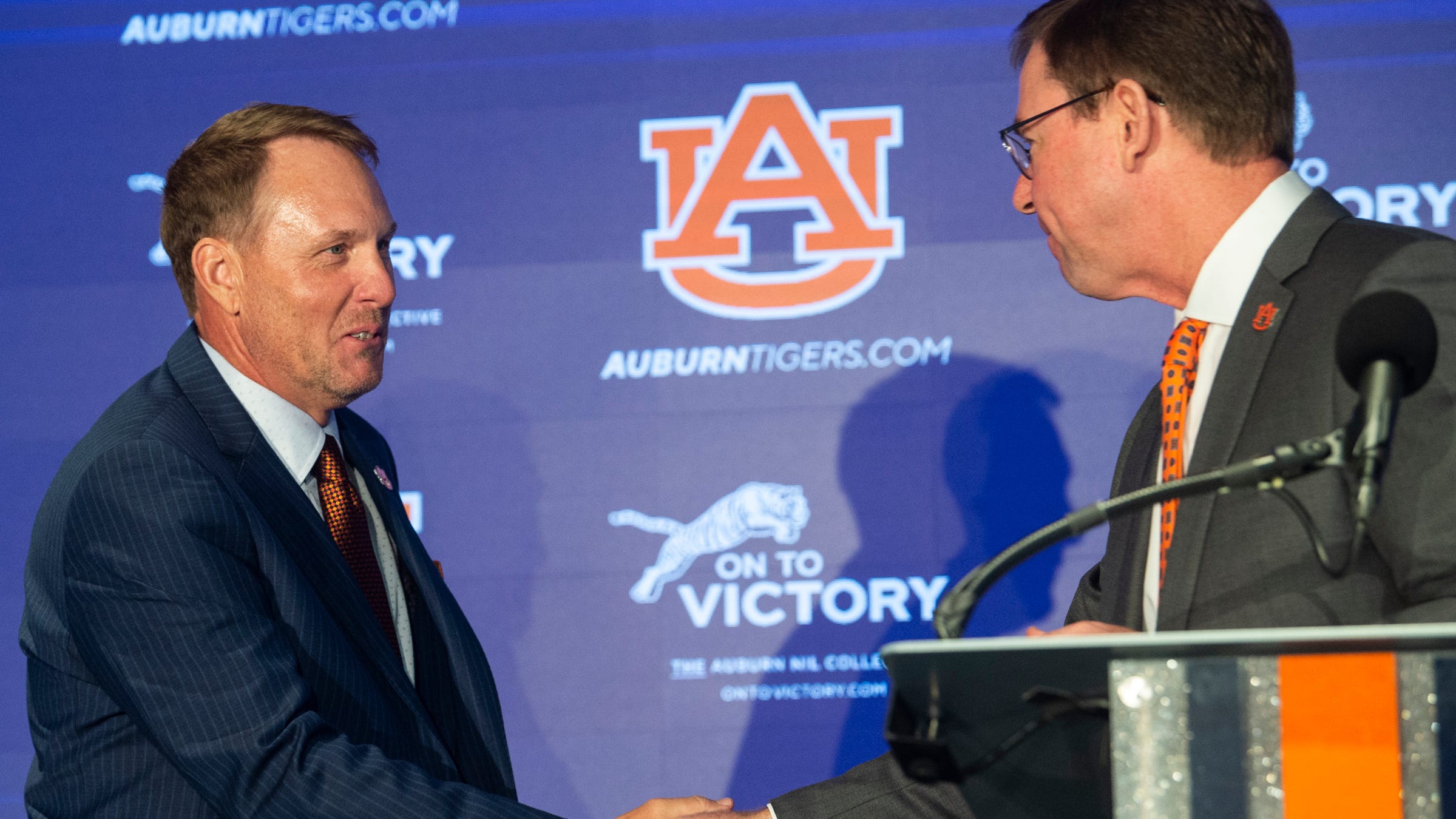 How much buyout money does Auburn football owe to its former staff