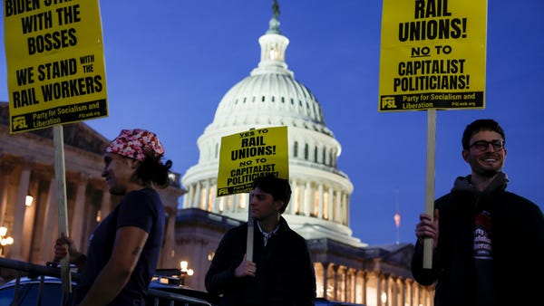 Activists in support of unionized rail workers pro