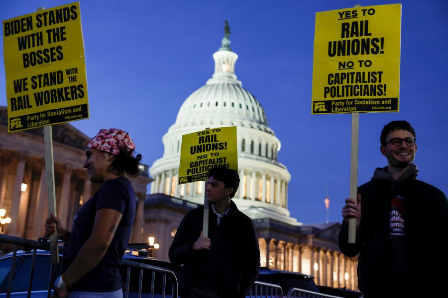 Activists in support of unionized rail workers protest outside the U.S. Capitol Building on November 29, 2022 in Washington, DC.