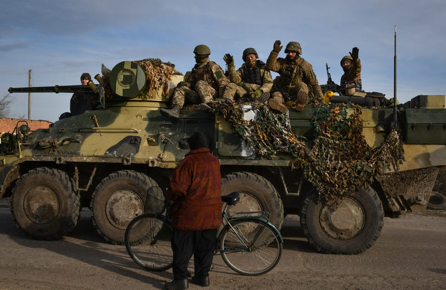 Ukrainian military vehicle pass by the village of Zarichne, Donetsk region, Ukraine, Friday, Dec. 2, 2022.