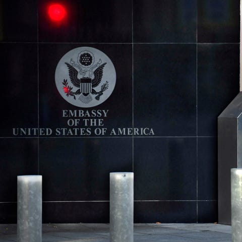 A Spanish policeman stands guard near the US embas