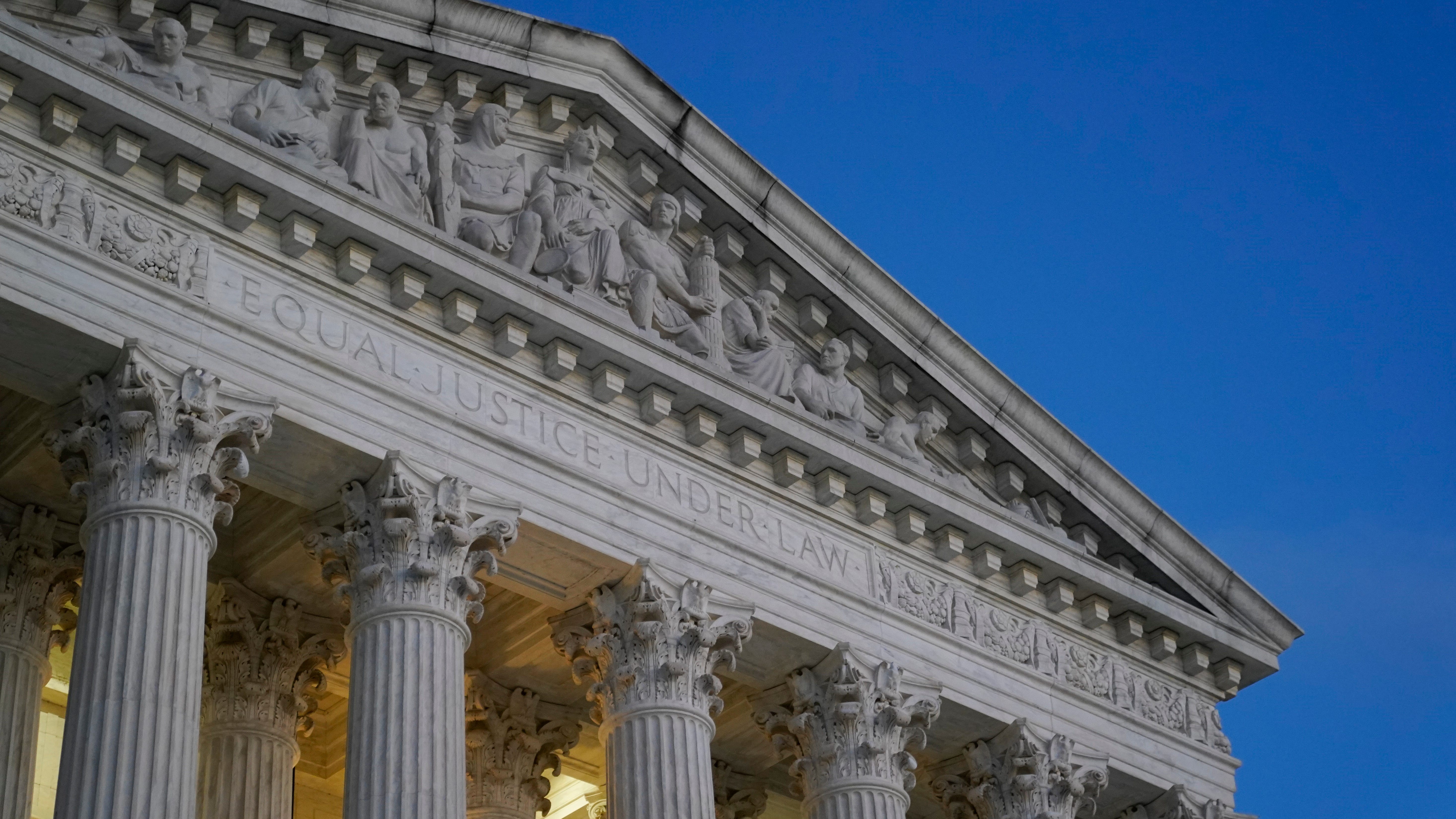 Light illuminates part of the Supreme Court building at dusk on Capitol Hill in Washington, Wednesday, Nov. 16, 2022. (AP Photo/Patrick Semansky) ORG XMIT: DCPS204