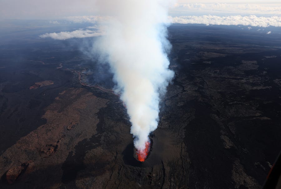 December 5, 2022: In an aerial view, lava shoots up from a fissure of Mauna Loa Volcano as it erupts in Hilo, Hawaii. For the first time in nearly 40 years, the Mauna Loa volcano, the largest active volcano in the world, has erupted.