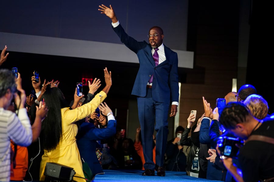 Democratic Sen. Raphael Warnock speaks during an election night watch party, Tuesday, Dec. 6, 2022, in Atlanta. Democratic Sen. Raphael Warnock has defeated Republican challenger Herschel Walker in a runoff election in Georgia.