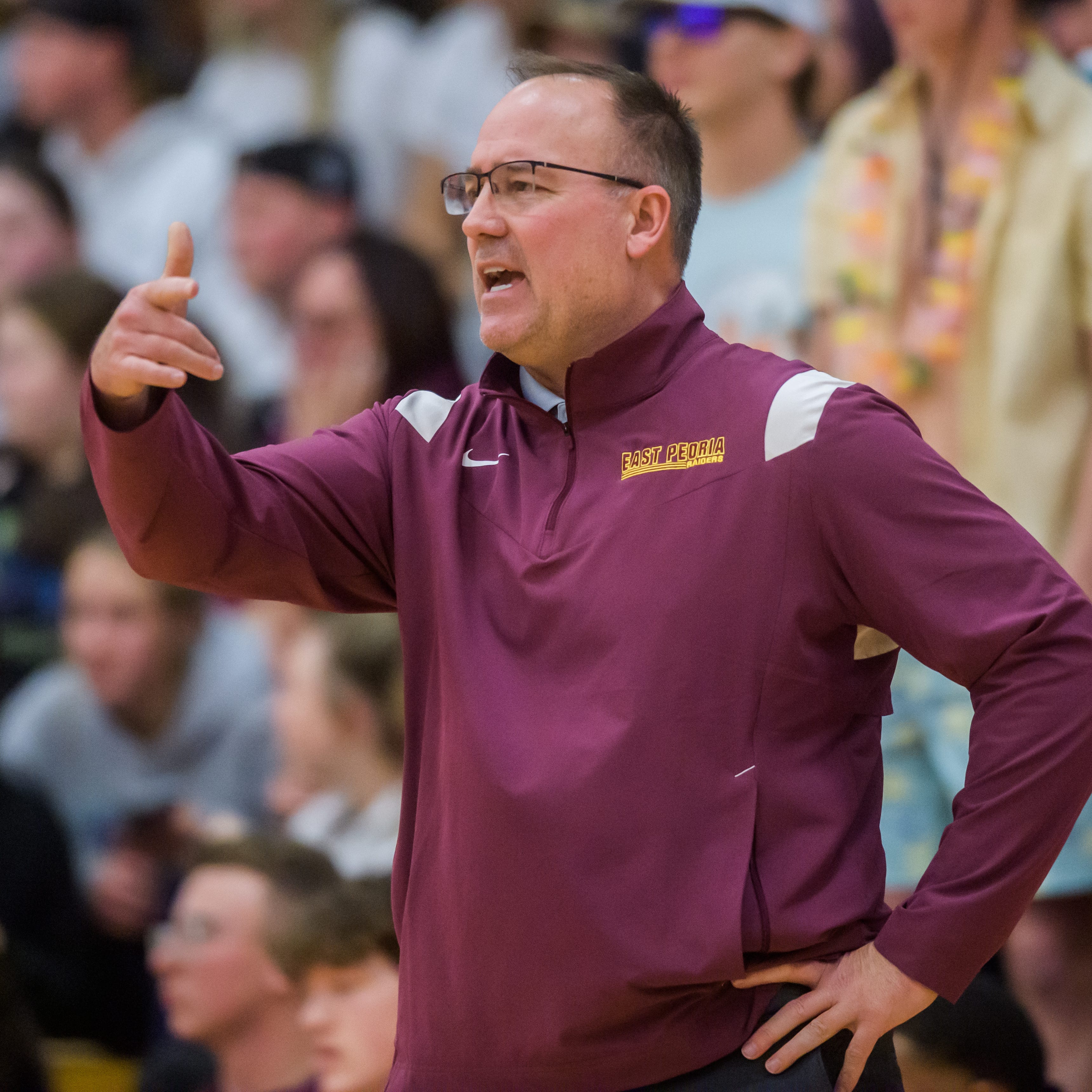 East Peoria head basketball coach Jon Grzanich leads his team against the Washington Panthers on Friday, Dec. 16, 2022 in Washington. The Raiders fell to the Panthers 52-45.