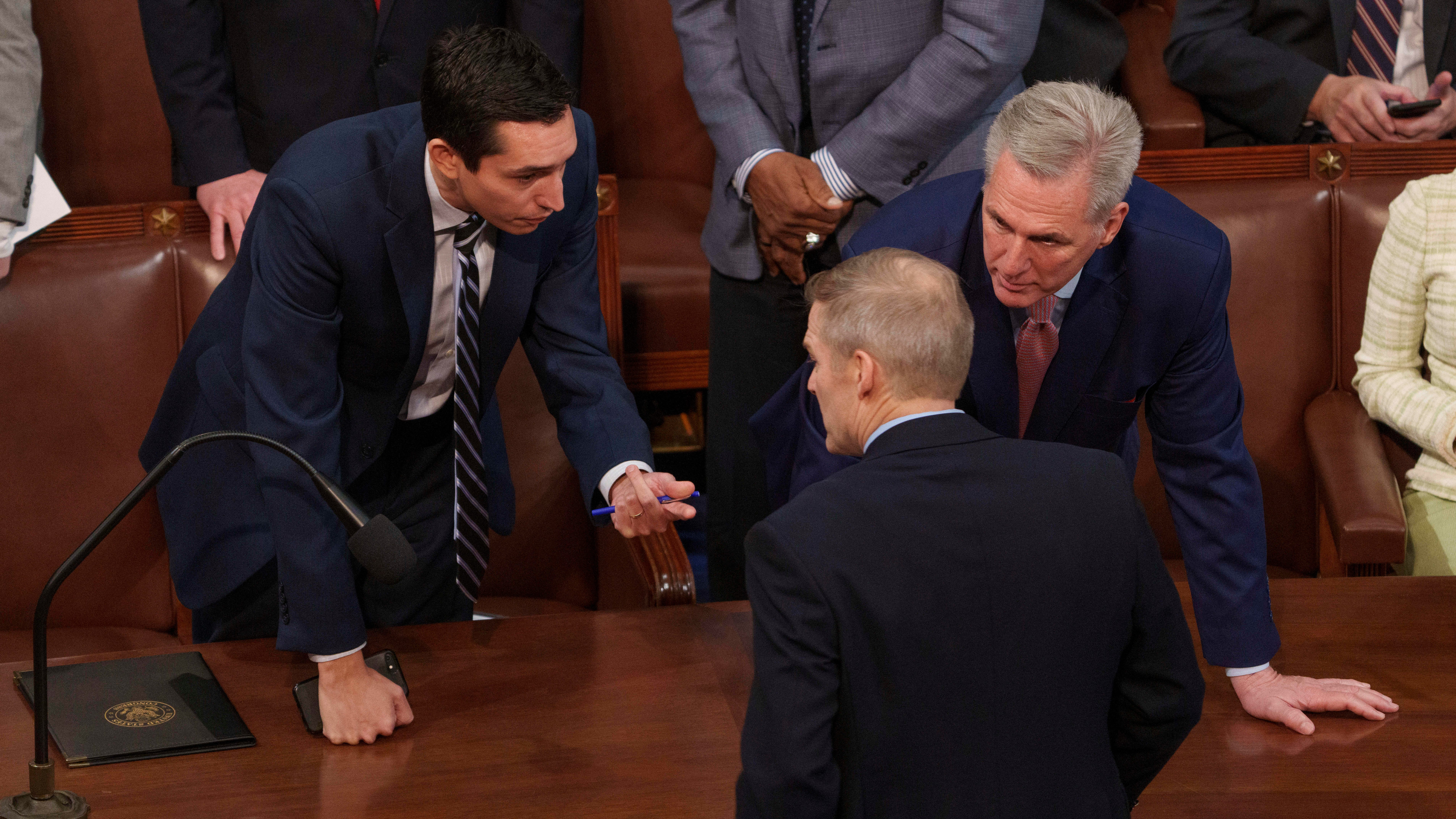 Rep. Kevin McCarthy (R-Calif.) talks with Congressman Jim Jordan (R-OH), front, after McCarthy failed to secure the necessary Republican votes to become House speaker, marking the first time a majority party's nominee has faltered on an initial ballot in a century on the first day of the 118th session of Congress begins on Jan. 3, 2023.