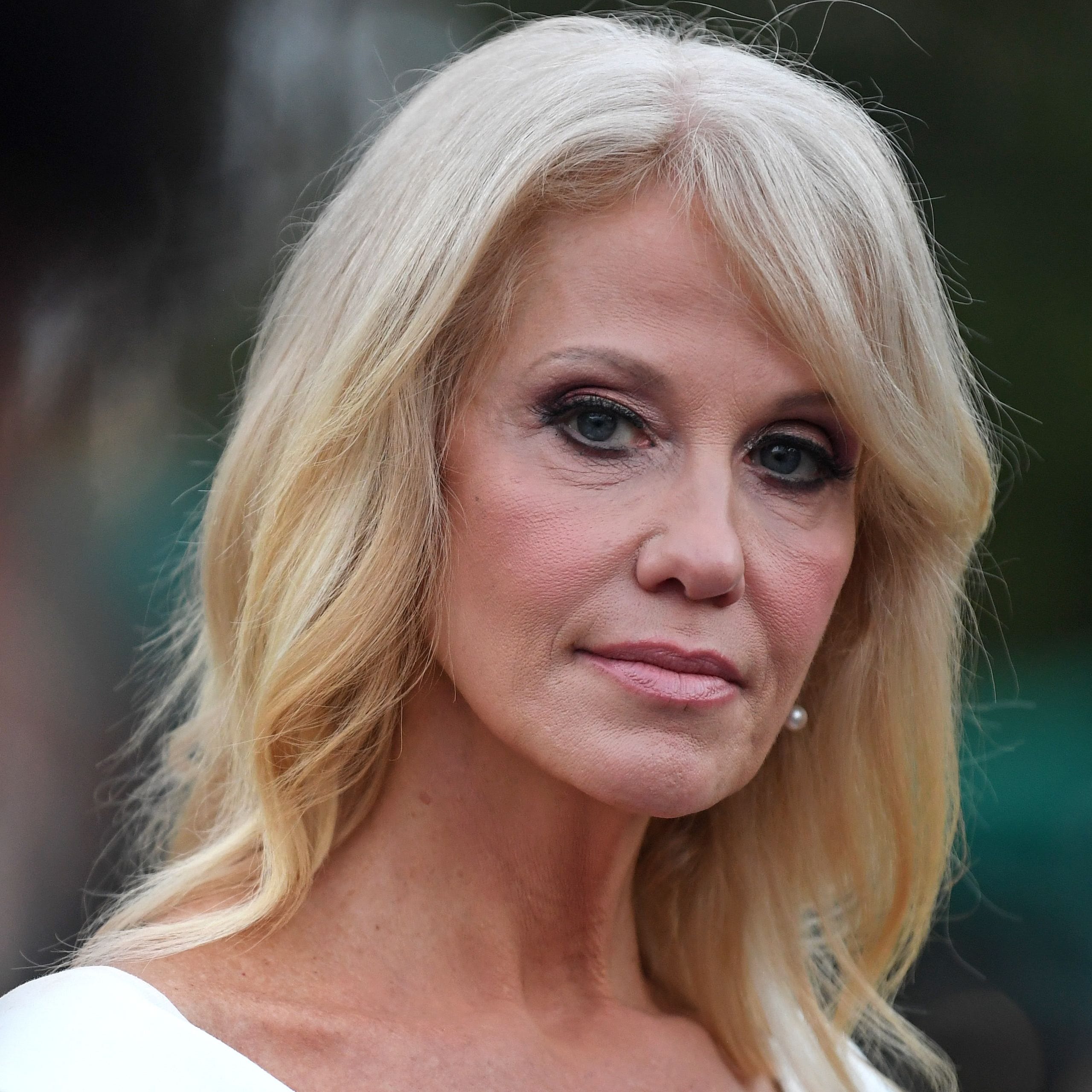 (FILES) In this file photo taken on August 26, 2020 Counselor to the President Kellyanne Conway speaks with the press at the White House in Washington, DC. - Former Counselor to the US President Kellyanne Conway said on October 2, 2020 that she has tested positive for Covid-19. President Donald Trump was hospitalized on October 2 and given an experimental Covid-19 treatment, but said he was "well," following bombshell news that the Republican had contracted the virus, knocking him off the campaign trail a   month from the US election. (Photo by Eric BARADAT / AFP) (Photo by ERIC BARADAT/AFP via Getty Images) ORG XMIT: 0 ORIG FILE ID: AFP_8RB6B7.jpg