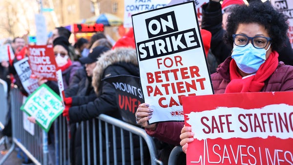 Nurses from Mount Sinai Hospital strike outside th