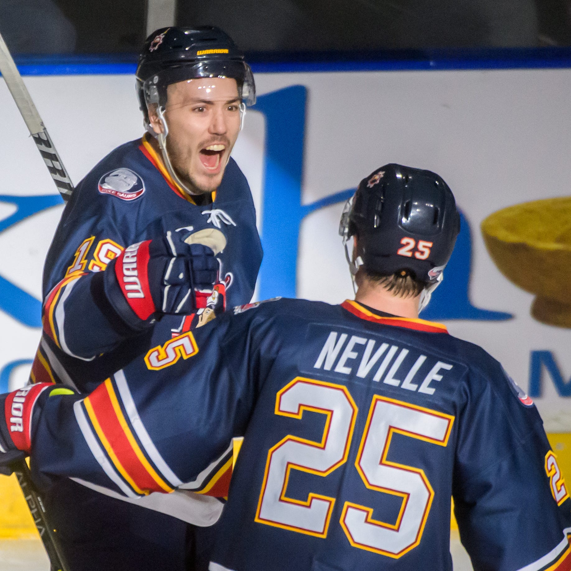 Peoria's Zach Wilkie celebrates his goal against Knoxville with teammate Nick Neville in the second period Friday, Jan. 13, 2023 at Carver Arena in Peoria. The Rivermen fell to the Ice Bears 6-4.