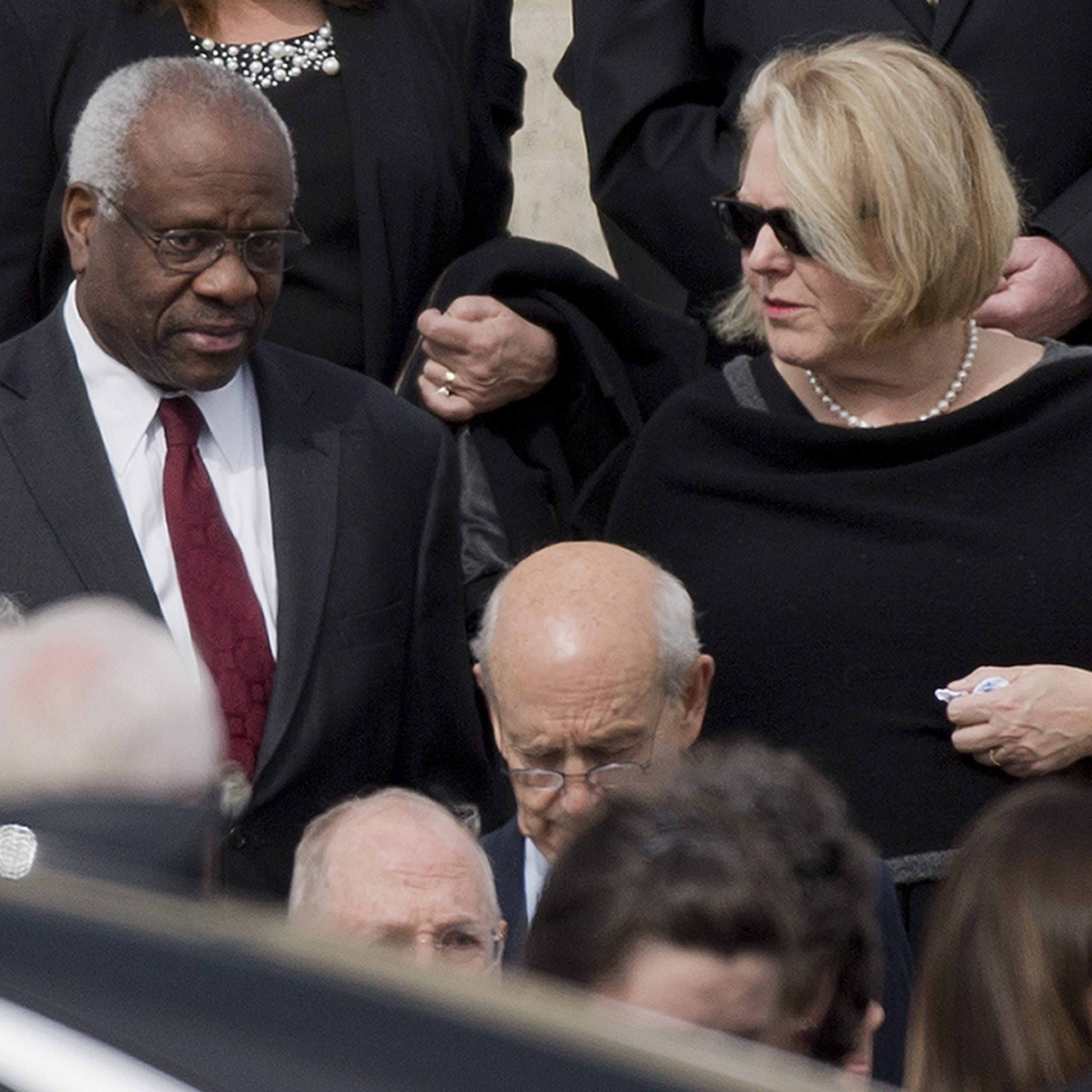 Supreme Court Justice Clarence Thomas and his wife, Ginni, leave funeral services for the late Justice Antonin Scalia in Washington in 2016.